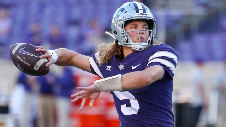 Oct 21, 2023; Manhattan, Kansas, USA; Kansas State Wildcats quarterback Avery Johnson (5) warms up before the start of a game against the TCU Horned Frogs at Bill Snyder Family Football Stadium. Mandatory Credit: Scott Sewell-USA TODAY Sports