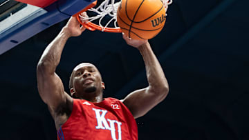 Kansas men's basketball's Darryn Peterson (22) dunks the ball during Late Night in the Phog, Friday, Oct. 17, 2025 at Allen Fieldhouse .