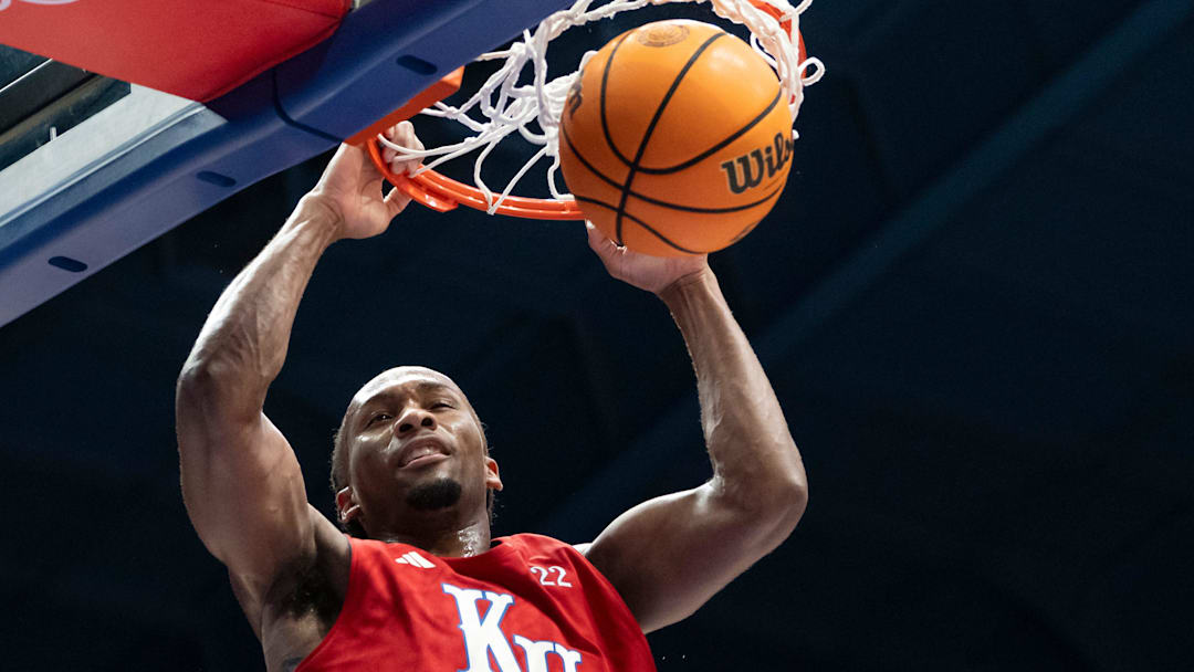 Kansas men's basketball's Darryn Peterson (22) dunks the ball during Late Night in the Phog, Friday, Oct. 17, 2025 at Allen Fieldhouse .