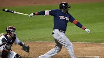 Boston Red Sox designated hitter David Ortiz hits  double in the eighth inning against the Cleveland Indians during Game One of the 2016 ALDS at Progressive Field.