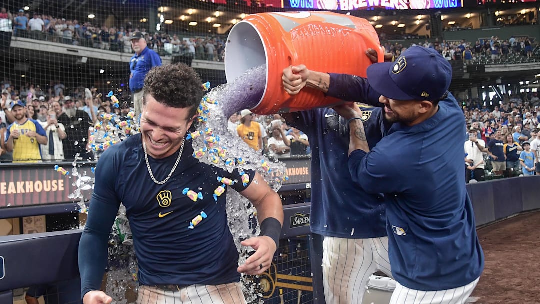 Aug 10, 2025; Milwaukee, Wisconsin, USA; Milwaukee Brewers left fielder Isaac Collins (6) gets a postgame dunk after hitting a walk-off home run against the New York Mets at American Family Field.