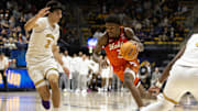 Jan 11, 2025; Berkeley, California, USA; Virginia Tech Hokies guard Jaydon Young (3) drives against California Golden Bears guard Andrej Stojakovic (2) during the second half at Haas Pavilion. Mandatory Credit: D. Ross Cameron-Imagn Images