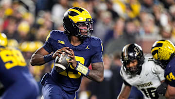 Michigan quarterback Bryce Underwood (19) looks to pass against Purdue during the first half at Michigan Stadium in Ann Arbor on Saturday, November 1, 2025.
