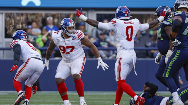 New York Giants defensive tackle Dexter Lawrence II (97) celebrates following a fourth down sack against the Seattle Seahawks