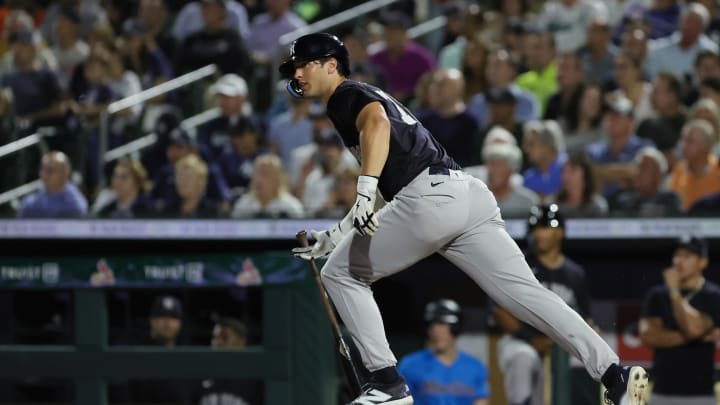 Mar 4, 2024; Jupiter, Florida, USA; New York Yankees outfielder Spencer Jones (78) hits a single against the Miami Marlins during the fifth inning at Roger Dean Chevrolet Stadium.