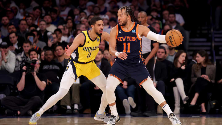 Feb 1, 2024; New York, New York, USA; New York Knicks guard Jalen Brunson (11) controls the ball against Indiana Pacers guard Tyrese Haliburton (0) during the first quarter at Madison Square Garden. Mandatory Credit: Brad Penner-USA TODAY Sports