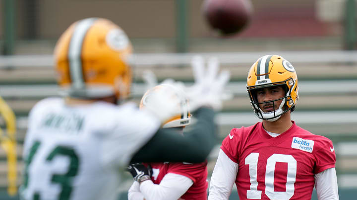 Green Bay Packers quarterback Jordan Love, shown during OTAs, will make his training camp debut on Saturday after signing a $220 million contract extension.