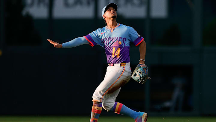 Jul 18, 2025; Denver, Colorado, USA; Colorado Rockies shortstop Ezequiel Tovar (14) gestures as he watches a pop fly in the third inning against the Minnesota Twins at Coors Field. Mandatory Credit: Isaiah J. Downing-Imagn Images