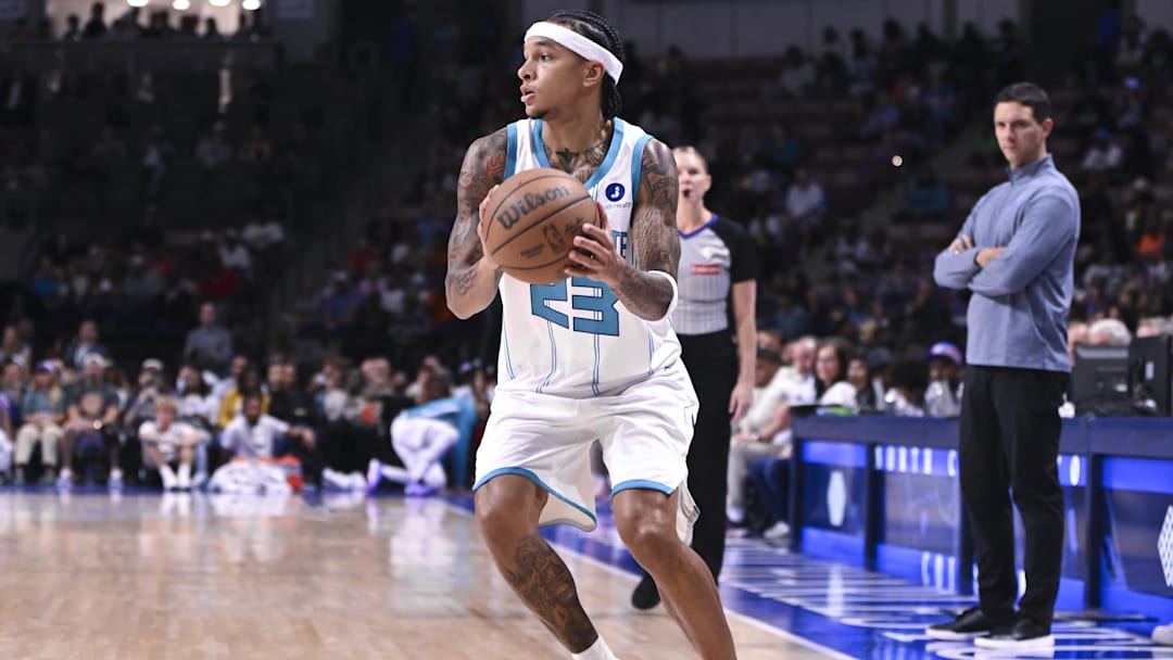 Oct 5, 2025; North Charleston, South Carolina, USA; Charlotte Hornets guard Tre Mann (23)  pivots at the 3-point line in the third quarter at North Charleston Coliseum. Mandatory Credit: Arthur Ellis-Imagn Images