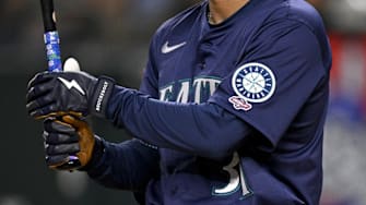 May 2, 2025; Arlington, Texas, USA; A view of the Seattle Mariners logo and MLB Debut logo on the jersey of right fielder Rhylan Thomas (31) during the second inning against the Texas Rangers at Globe Life Field. Mandatory Credit: Jerome Miron-Imagn Images