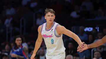 Apr 7, 2025; Miami, Florida, USA; Miami Heat guard Pelle Larsson (9) celebrates after scoring against the Philadelphia 76ers during the first quarter at Kaseya Center. Mandatory Credit: Sam Navarro-Imagn Images