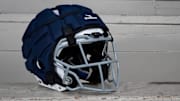 A Guardian Cap adorns a helmet at Pleasant Hill High School in Oregon.