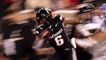 Cincinnati Bearcats running back Evan Pryor (6) is forced out of bounds in the fourth quarter of the NCAA football game between the Cincinnati Bearcats and BYU Cougars at Nippert Stadium in Cincinnati on Nov. 22, 2025.
