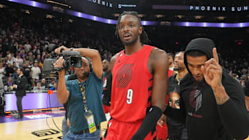 Nov 4, 2022; Phoenix, Arizona, USA; Portland Trail Blazers forward Jerami Grant (9) celebrates with teammates after making a game winning shot against the Phoenix Suns during the second half at Footprint Center. Mandatory Credit: Joe Camporeale-Imagn Images