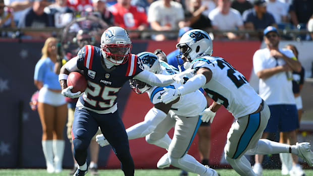 New England Patriots cornerback Marcus Jones (25) runs the ball.