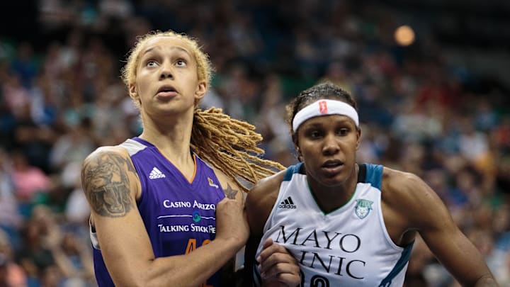 Jun 27, 2015; Minneapolis, MN, USA; Phoenix Mercury center Brittney Griner (42) and Minnesota Lynx forward Rebekkah Brunson (32) battle for a rebound in the fourth quarter at Target Center. The Minnesota Lynx beat the Phoenix Mercury 71-56.  Mandatory Credit: Brad Rempel-Imagn Images