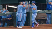 Sep 24, 2023; Arlington, Texas, USA; Texas Rangers left fielder Evan Carter (32) and third baseman Josh Jung (6) celebrate after Carter hits a two run home run during the sixth inning against the Seattle Mariners at Globe Life Field. Mandatory Credit: Jerome Miron-USA TODAY Sports