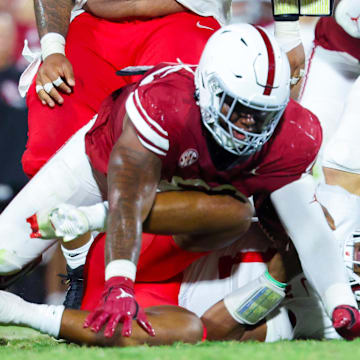 Oklahoma defensive lineman Gracen Halton (56) sacks Houston quarterback Donovan Smith.