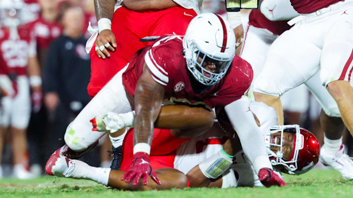 Oklahoma defensive lineman Gracen Halton (56) sacks Houston quarterback Donovan Smith.