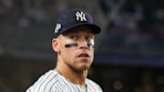 Oct 2, 2025; Bronx, New York, USA; New York Yankees outfielder Aaron Judge (99) stands on the dugout steps prior game three of the Wildcard round for the 2025 MLB playoffs against the Boston Red Sox at Yankee Stadium. Mandatory Credit: Vincent Carchietta-Imagn Images