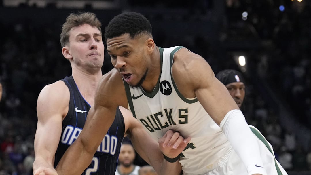 Mar 8, 2025; Milwaukee, Wisconsin, USA; Milwaukee Bucks forward Giannis Antetokounmpo (34) drives against Orlando Magic forward Franz Wagner (22) in the first half at Fiserv Forum. Mandatory Credit: Michael McLoone-Imagn Images Mar 8, 2025; Milwaukee, Wisconsin, USA; Milwaukee Bucks forward Giannis Antetokounmpo (34) drives against Orlando Magic forward Franz Wagner (22) in the first half at Fiserv Forum. Mandatory Credit: Michael McLoone-Imagn Images