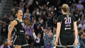 Jun 7, 2025; San Francisco, California, USA; Golden State Valkyries guard Kate Martin (20) reacts with guard Veronica Burton (left) after making a three point basket against the Las Vegas Aces to end the second quarter at Chase Center. Mandatory Credit: Darren Yamashita-Imagn Images