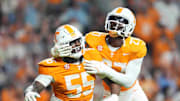 Tennessee defensive lineman James Pearce Jr. (27) celebrates Tennessee defensive lineman Omarr Norman-Lott’s (55) sack during an NCAA college football game between Tennessee and Mississippi State at Neyland Stadium in Knoxville, Tenn., Saturday, Nov. 9, 2024.