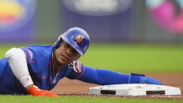 Sep 5, 2025; Cincinnati, Ohio, USA; New York Mets outfielder Juan Soto (22) reacts after he steals third base against the Cincinnati Reds in the first inning at Great American Ball Park. Mandatory Credit: Aaron Doster-Imagn Images