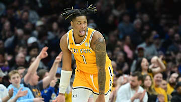 Mar 11, 2023; Cleveland, OH, USA; Kent State Golden Flashes forward VonCameron Davis (1) celebrates after a three point basket during the first half against the Toledo Rockets at Rocket Mortgage Field House. Mandatory Credit: Ken Blaze-Imagn Images