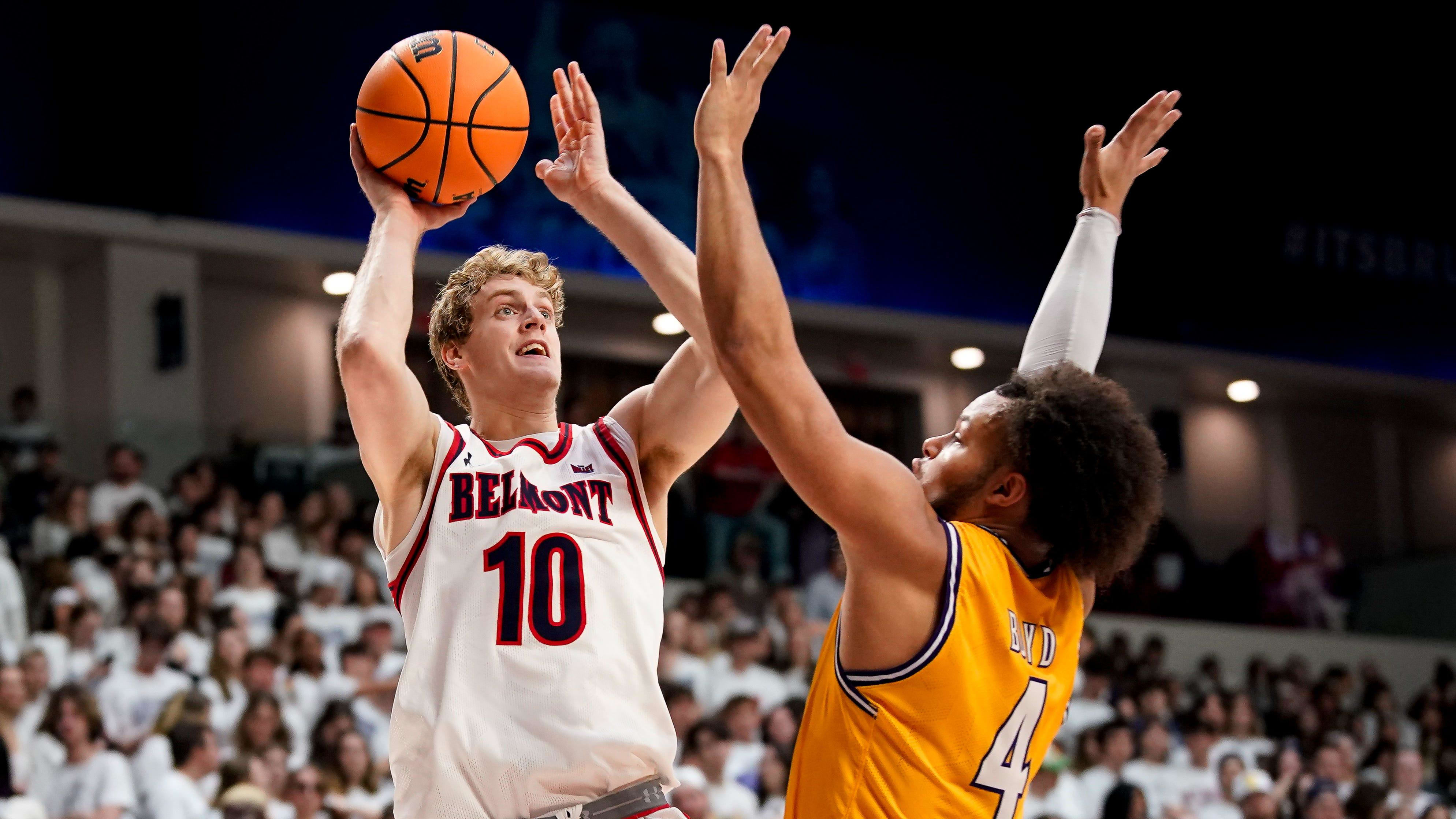 Belmont guard Cade Tyson (10) shoots over Lipscomb guard Derrin Boyd (4) during the second half at
