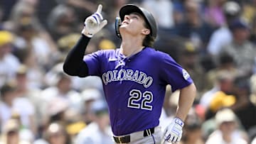 Colorado Rockies right fielder Mickey Moniak (22) points skyward after hitting a solo home run during the fourth inning against the San Diego Padres at Petco Park. 