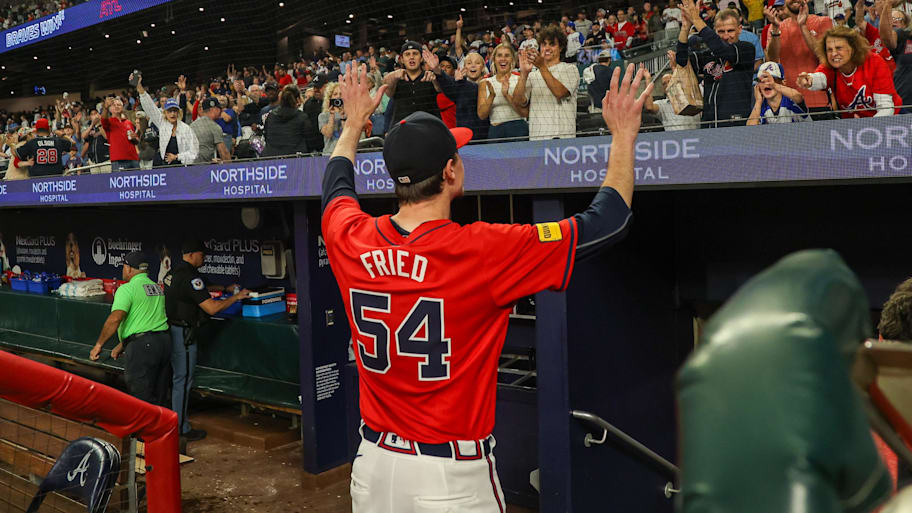 Atlanta Braves starting pitcher Max Fried (54) acknowledges fans after a victory over the Kansas City Royals 