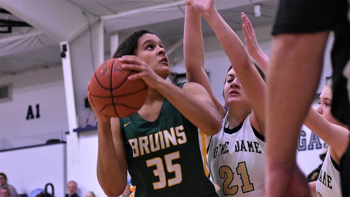 Rock Bridge's Jayda Porter (35) battles the Quincy Notre Dame defense during the Sophie Cunningham Classic on Dec. 4, 2022, at Columbia, Mo.

Dsc 1228 2