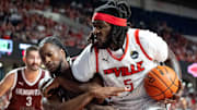 The Ville's Montrezl Harrell (5) fights for the rebound against UKnighted's Ginikachukwu Ojiako (44) during their game on Saturday, July 20, 2024 in Louisville, Ky. at Freedom Hall during the first round of The Basketball Tournament.
