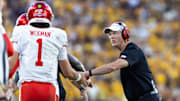 Oct 25, 2025; Tempe, Arizona, USA; Houston Cougars head coach Willie Fritz with quarterback Conner Weigman (1) against the Arizona State Sun Devils at Mountain America Stadium. Mandatory Credit: Mark J. Rebilas-Imagn Images