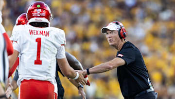 Oct 25, 2025; Tempe, Arizona, USA; Houston Cougars head coach Willie Fritz with quarterback Conner Weigman (1) against the Arizona State Sun Devils at Mountain America Stadium. Mandatory Credit: Mark J. Rebilas-Imagn Images