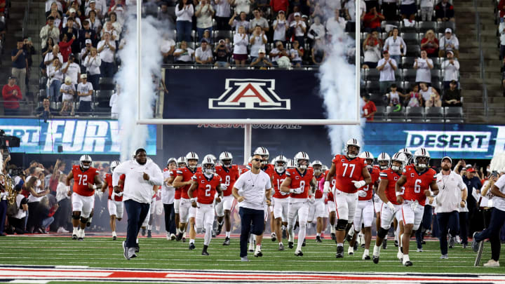 Oct 28, 2023; Tucson, Arizona, USA; The Arizona Wildcats runs onto the field before a game against the Oregon State Beavers at Arizona Stadium