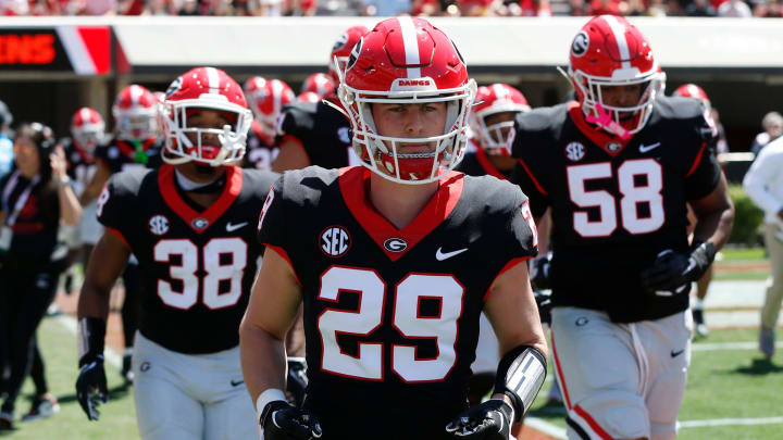 The Black team takes the field before the start of the G-Day spring football game in Athens, Ga., on Saturday, April 13, 2024.