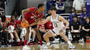 Jan 29, 2025; Evanston, Illinois, USA;Northwestern Wildcats guard Brooks Barnhizer (13) defends Rutgers Scarlet Knights guard Ace Bailey (4) during the second half at Welsh-Ryan Arena. Mandatory Credit: David Banks-Imagn Images
