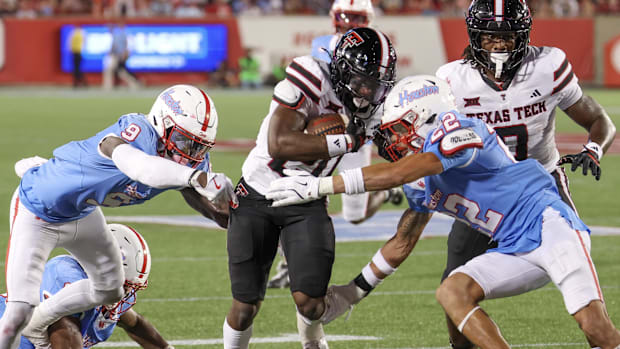 Texas Tech Red Raiders running back J'Koby Williams (20) rushes against the Houston Cougars