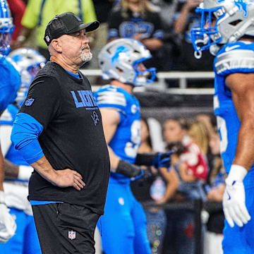 Detroit Lions offensive coordinator John Morton watches warm up at Ford Field in Detroit 
