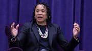 University of South Carolina women's basketball coach Dawn Staley answers a question by moderator Dan Hughes during the University of Mount Union's Schooler Lecture speaker series April 23, 2025, in Alliance, Ohio.