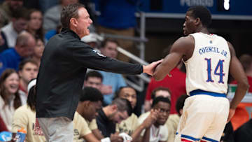 Kansas Jayhawks head coach Bill Self puts Kansas Jayhawks guard Melvin Council Jr. (14) out of the game after an injury during the first half of the game against Texas A&M-Corpus Christi Islanders inside Allen Fieldhouse on Nov. 11, 2025.