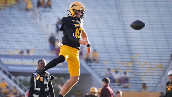 ASU Sun Devils quarterback Sam Leavitt (10) warms up before the game against the Houston Cougars at Mountain America Stadium in Tempe on Oct. 25, 2025.