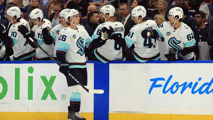 Oct 15, 2026; Tampa, Florida, USA;  Seattle Kraken center Ryan Winterton (26) is congratulated  after he scored a goal against the Tampa Bay Lightning during the first period at Benchmark International Arena.  Mandatory Credit: Kim Klement Neitzel-Imagn Images