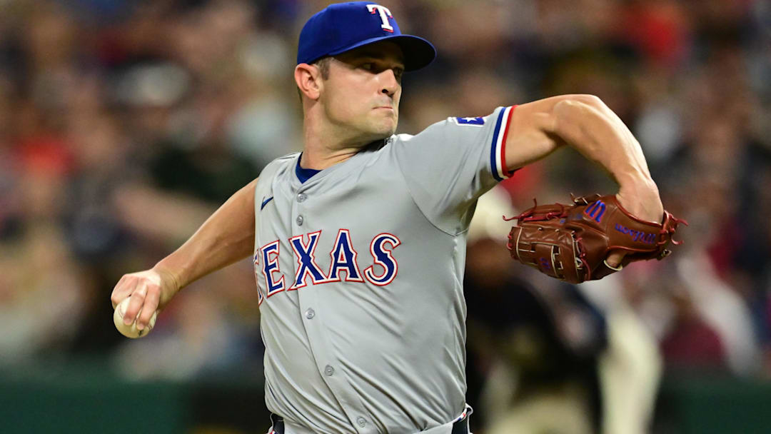 Aug 23, 2024; Cleveland, Ohio, USA; Texas Rangers relief pitcher David Robertson (37) throws a pitch during the eighth inning against the Cleveland Guardians at Progressive Field. 
