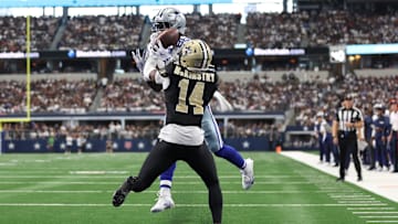 Sep 15, 2024; Arlington, Texas, USA; Dallas Cowboys wide receiver CeeDee Lamb (88) cannot catch a pass while defended by New Orleans Saints cornerback Kool-Aid McKinstry (14) at AT&T Stadium. Mandatory Credit: Tim Heitman-Imagn Images