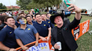 Pat McAfee with Michigan fans on his way to the stage at ESPN College GameDay ahead of the Oklahoma-Michigan college football