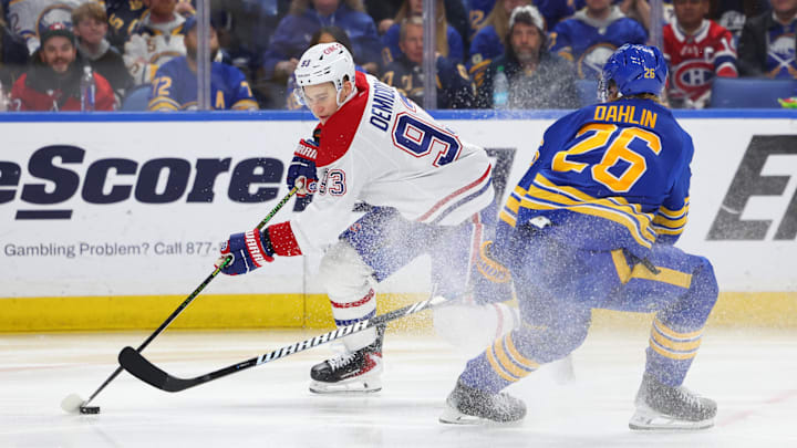 May 14, 2026; Buffalo, New York, USA; Montréal Canadiens right wing Ivan Demidov (93) controls the puck as Buffalo Sabres defenseman Rasmus Dahlin (26) defends during the third period in game five of the second round of the 2026 Stanley Cup Playoffs at KeyBank Center. Mandatory Credit: Timothy T. Ludwig-Imagn Images