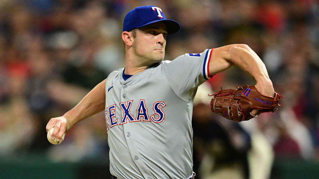Aug 23, 2024; Cleveland, Ohio, USA; Texas Rangers relief pitcher David Robertson (37) throws a pitch during the eighth inning against the Cleveland Guardians at Progressive Field. Mandatory Credit: Ken Blaze-Imagn Images